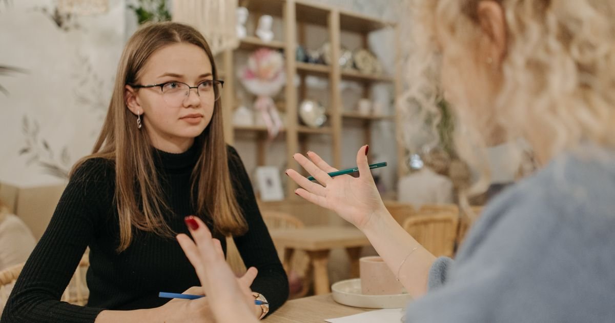Two small business owners planning growth strategies at a table